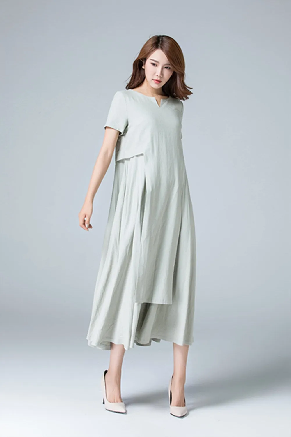 Plain linen dress with irregular folds 1787